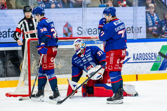 Oskarshamns Axel Landén, målvakt Evan Cowley och Filip
