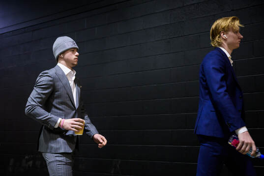 Lucas Raymond and Rasmus Dahlin of Sweden arrive to the