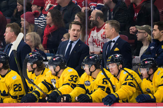 Assistant coach Daniel Alfredsson, head coach Sam Hallam