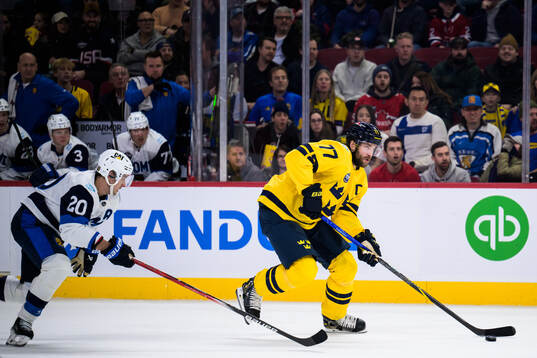 Sebastian Aho of Finland and Victor Hedman of Sweden