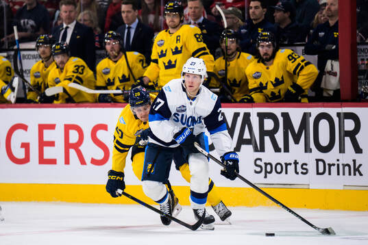 Joel Eriksson Ek of Sweden and Eetu Luostarinen of Finland