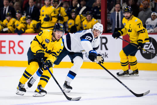 Jesper Bratt of Sweden and Eetu Luostarinen of Finland