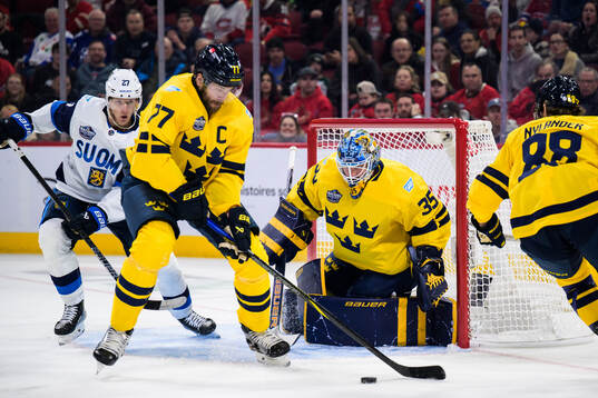 Eetu Luostarinen of Finland challenges Victor Hedman and