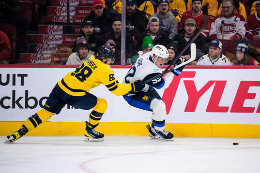 William Nylander of Sweden and Patrik Laine of Finland