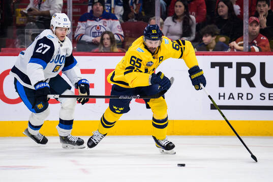 Eetu Luostarinen of Finland and Erik Karlsson of Sweden