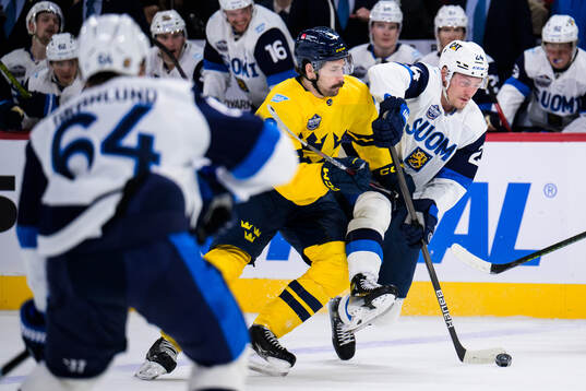 Filip Forsberg of Sweden and Roope Hintz of Finland