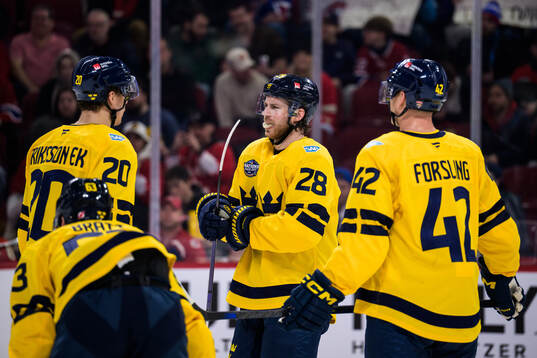 Joel Eriksson Ek, Elias Lindholm and Gustav Forsling of