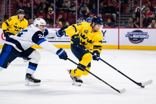 Roope Hintz of Finland and Gustav Forsling of Sweden