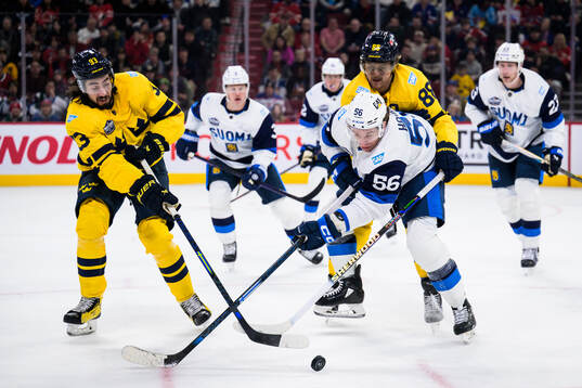 Mika Zibanejad and William Nylander of Sweden in action