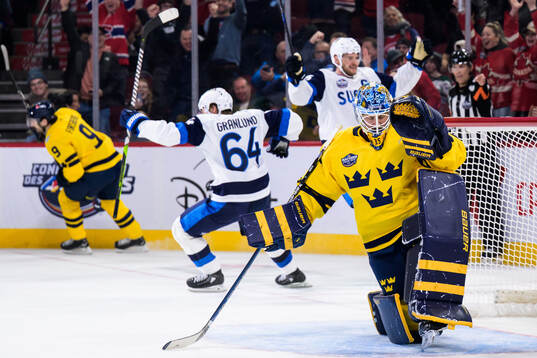 Goaltender Linus Ullmark of Sweden looks dejected