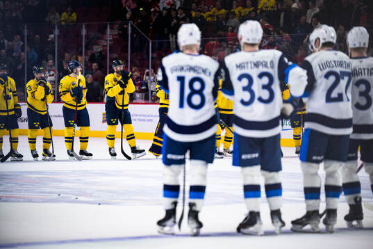 Players of Sweden look dejected