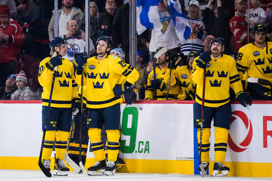 Joel Eriksson Ek, Adrian Kempe and Filip Forsberg of Sweden