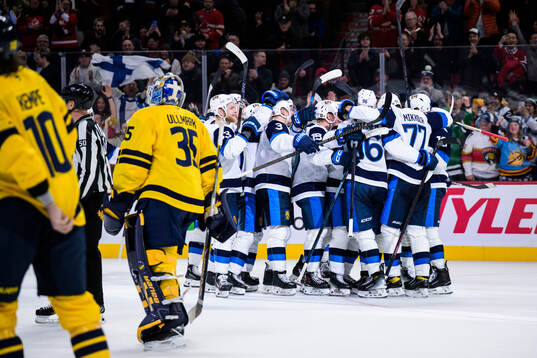 Players of Finland celebrate