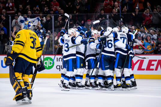 Players of Finland celebrate