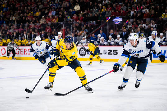 Joel Eriksson Ek of Sweden and Niko Mikkola of Finland