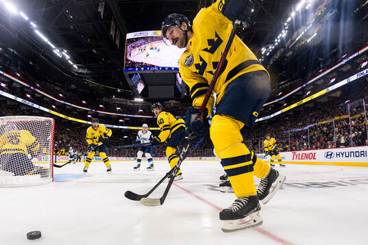Erik Karlsson, Elias Pettersson and Filip Forsberg of Sweden