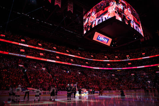 Players of Canada enter the ice for the Four Nations