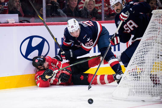 Sidney Crosby of Canada and Charlie McAvoy of USA