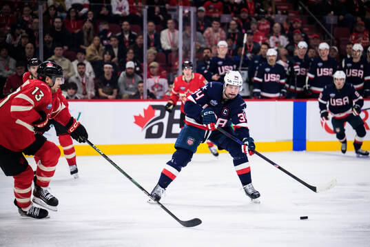 Sam Reinhart of Canada and Auston Matthews of USA