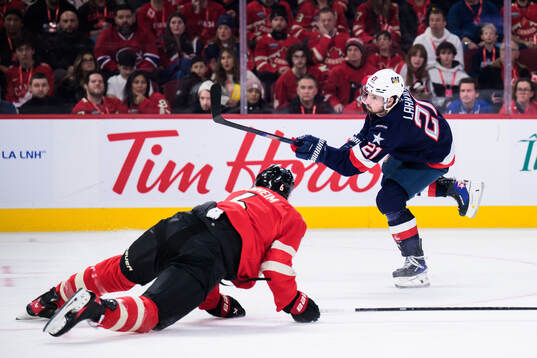 Dylan Larkin of USA scores 1-2
