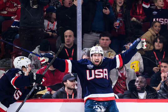 Matt Boldy and Dylan Larkin of USA celebrate the 1-2 goal
