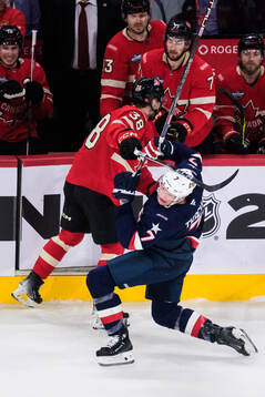Brandon Hagel of Canada and Brady Tkachuk of USA