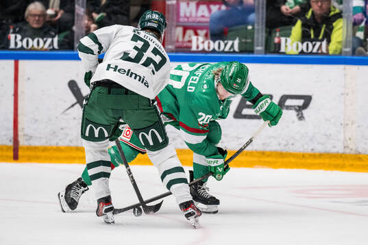 Färjestads Magnus Nygren och Rögles Joachim Blichfeld