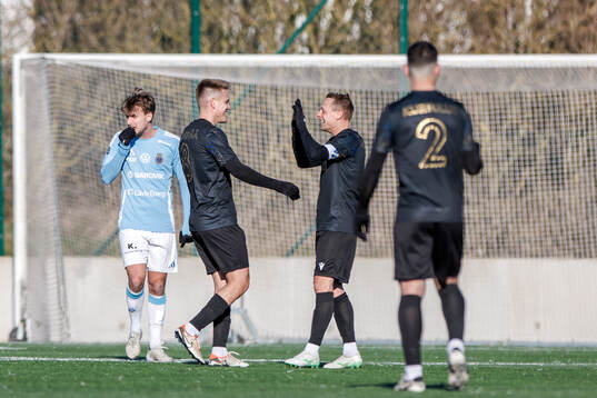 Halmstads Niilo Mäenpää och Joel Allansson jublar