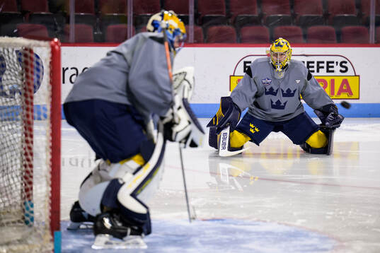 Goaltenders Samuel Ersson and Filip Gustavsson of Sweden at