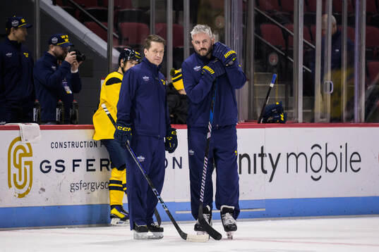 Head coach Sam Hallam and scouting coach Myles Fee of