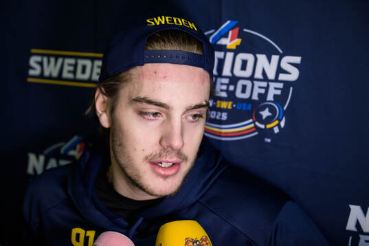 Leo Carlsson of Sweden is being interviewed by media