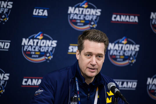Head coach Sam Hallam of Sweden is being interviewed by