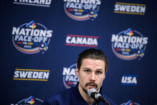 Erik Karlsson of Sweden is being interviewed by media