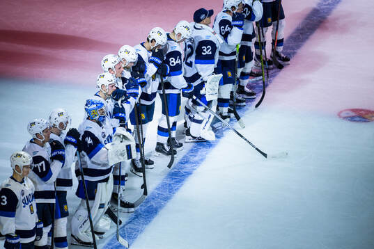 Players of Finland look dejected