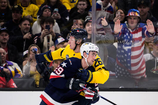 Brock Nelson of USA and Rasmus Dahlin of Sweden
