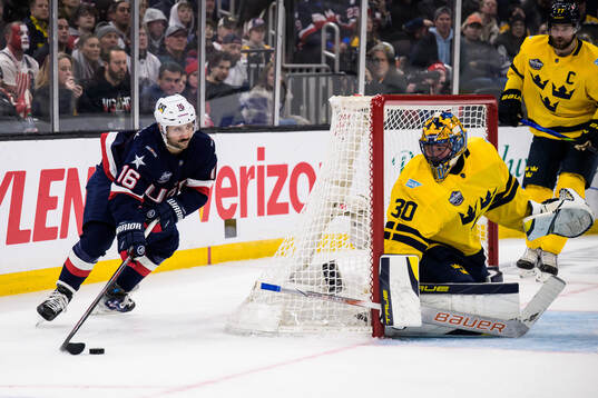 Vincent Trocheck of USA and goaltender Samuel Ersson of