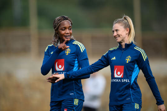 Evelyn Ijeh and Rebecka Blomqvist of Sweden of the