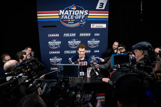 Matthew Tkachuk of USA is being interviewed by media