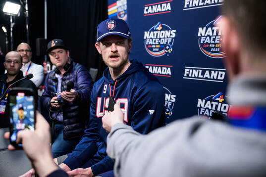 Jack Eichel of USA is being interviewed by media