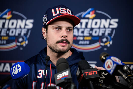 Auston Matthews of USA is being interviewed by media