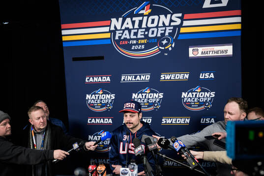 Auston Matthews of USA is being interviewed by media