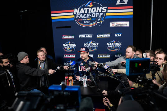 Auston Matthews of USA is being interviewed by media