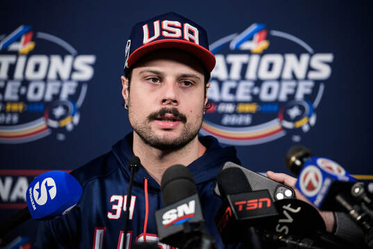 Auston Matthews of USA is being interviewed by media
