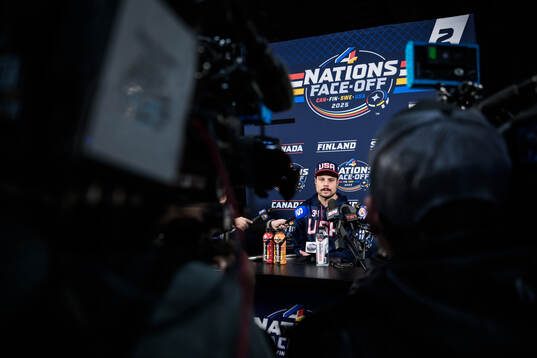 Auston Matthews of USA is being interviewed by media