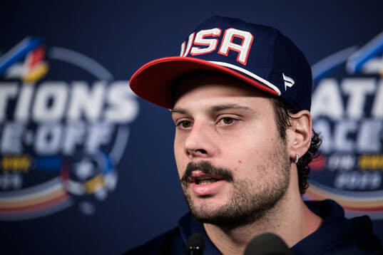 Auston Matthews of USA is being interviewed by media