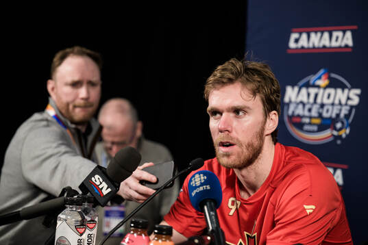 Connor McDavid of Canada is being interviewed by media