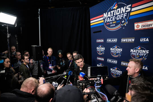 Sidney Crosby of Canada is being interviewed by media