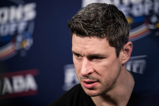 Sidney Crosby of Canada is being interviewed by media