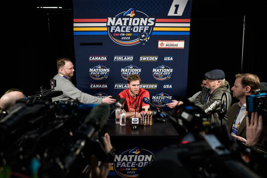 Connor McDavid of Canada is being interviewed by media