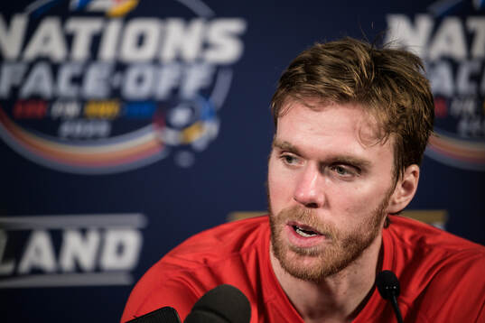 Connor McDavid of Canada is being interviewed by media